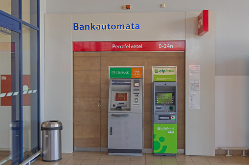 Szeged, Hungary - August 01, 2022: Atm Machines Otp Bank Cib Cash Dispenser in Tesco Supermarket and Shopping Mall Located in Sunshine Park.