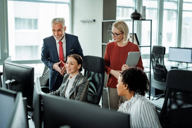 istock Colleagues working together at the modern office 2149321113