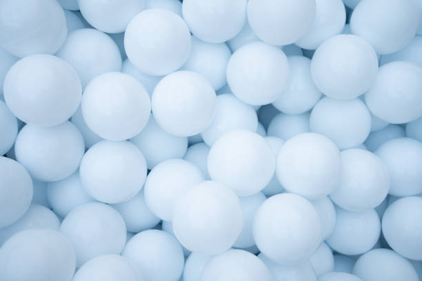istock Many blue plastic balls for dry pool. 2149321211