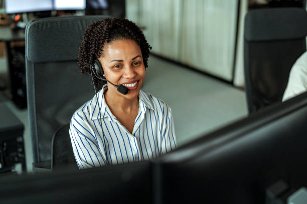 istock Beautiful well dressed woman working at call enter 2149321228