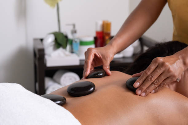 istock Thai massage with volcanic stones 2149323276