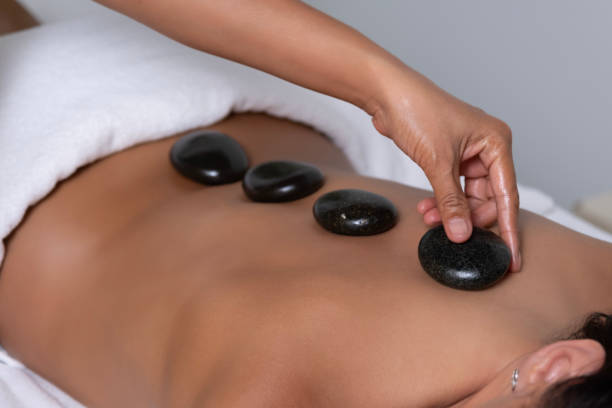 istock Thai massage with volcanic stones 2149323280