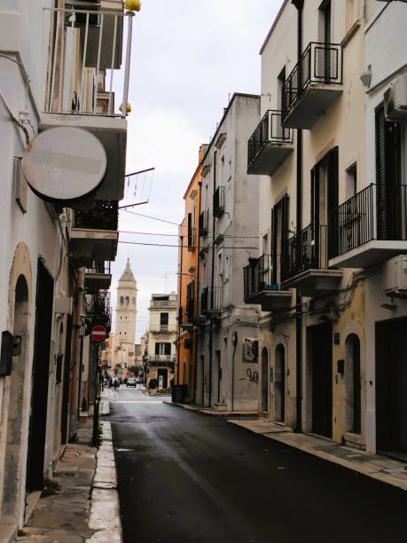 istock Alleyway with a tower 2149323336