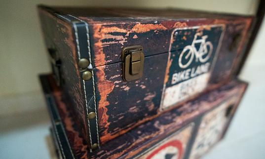 Travel boxes and suitcases printed with traffic and bicycle themes