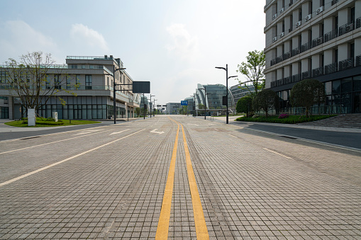 Empty paths and modern office buildings in science and technology parks， Chongqing, China