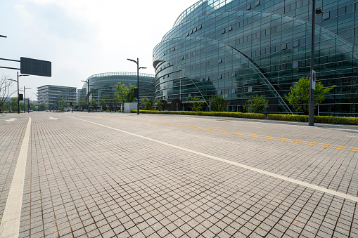Empty paths and modern office buildings in science and technology parks， Chongqing, China