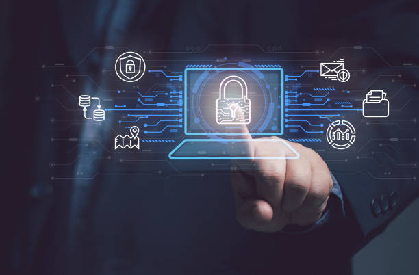 istock Man points at key icon on virtual screen of laptop Protecting security in online transactions identity theft internet cyber crime. Concept of protect data and privacy. Keep identity database. 2149330466