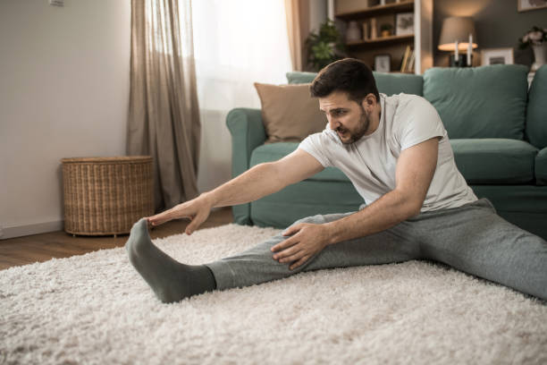 istock Mid adult man working out at home. 2149332272