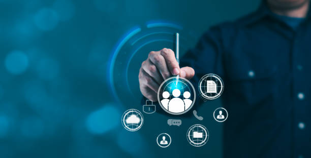 istock A man is pointing at a people on a virtual screen and a circle with people inside 2149334055