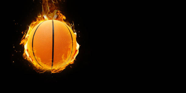istock basketball ball on fire Isolated on a black background 2149334198