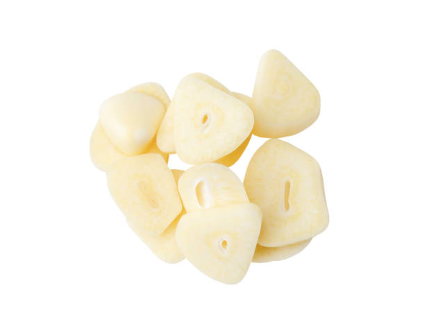 istock Top view set of garlic slices or pieces in stack isolated on white background with clipping path 2149334887