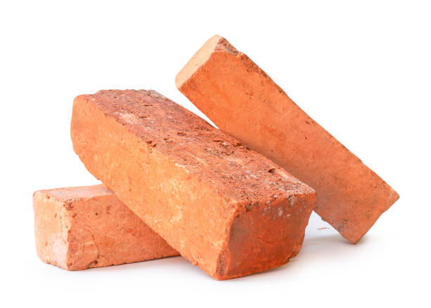 istock Side view of old cracked red or orange bricks in stack isolated on white background with clipping path. Construction materials 2149335243