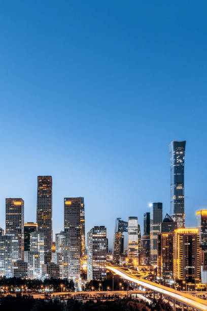 istock High View Night Scenery of Beijing International Trade CBD Architecture Complex in China 2149342401