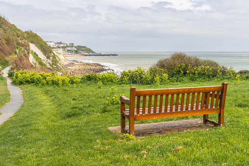 A bench near Castle Cove overlooking Ventnor Bay on the Isle of Wight, England, UK