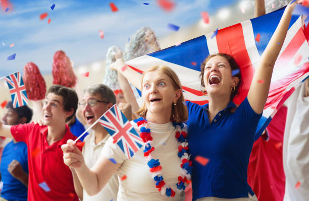 istock UK team supporter on stadium. British fans. 2149349970