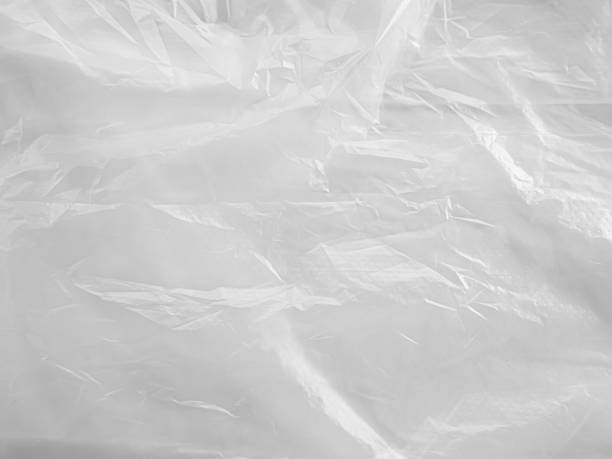 istock Plastic White Bag Wrap Film Grunge Overlay Effect Background Mockup Foil Pack Design Wrnkle Abstract Grey Texture Pattern Element Clear Polyethylene Wrapper Pattern Material Layer Surface Template. 2149349987