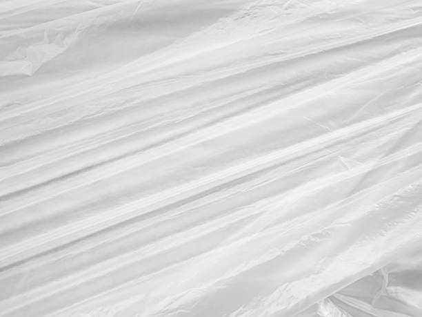 istock Plastic White Bag Wrap Film Grunge Overlay Effect Background Mockup Foil Pack Design Wrnkle Abstract Grey Texture Pattern Element Clear Polyethylene Wrapper Pattern Material Layer Surface Template. 2149349990