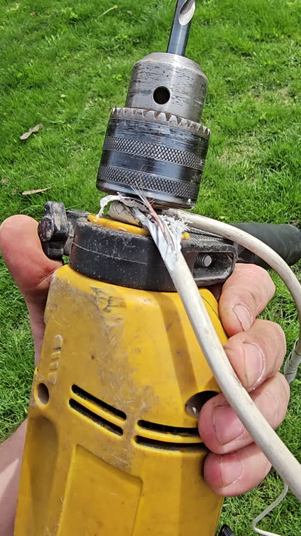 the wire got wrapped and damaged around the chuck of an old hand-held electric drill