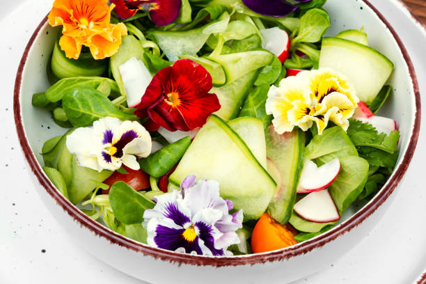 istock Colorful vegetable salad with edible flowers. 2149357219