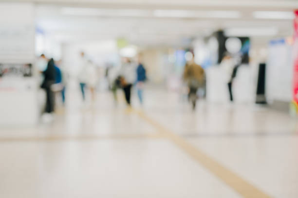 istock A blurred image of people walking in an airport 2149360701