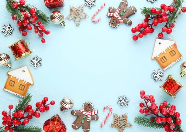 istock Christmas ornaments and cookies on blue background 2149361824