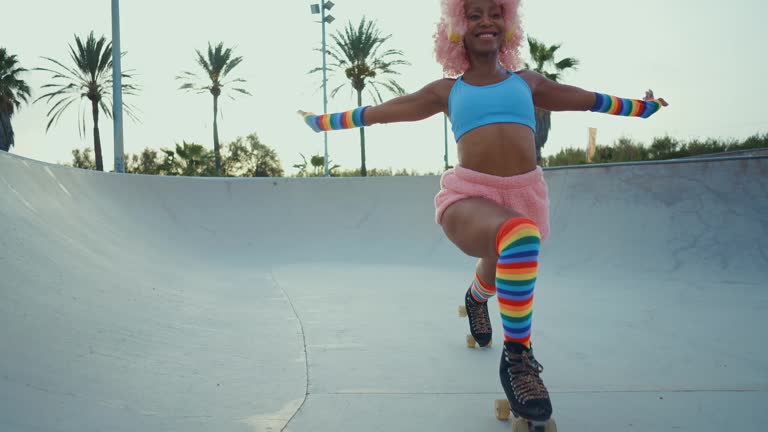 Beautiful woman skating with roller skates and having fun.