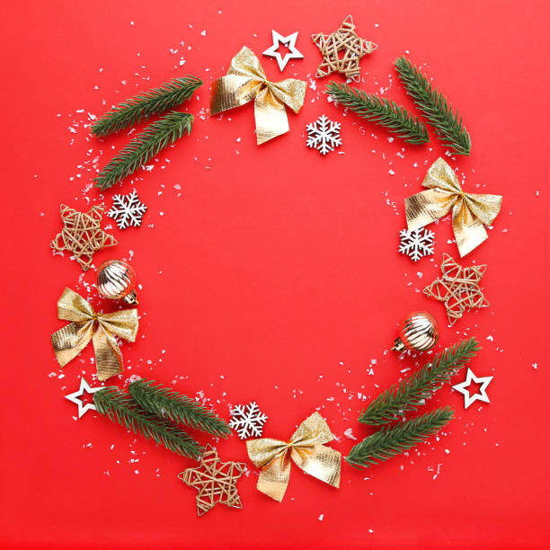 istock Christmas ornaments on red background 2149362039