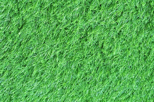Artificial turf is a surface of synthetic fibers made to look like natural grass, used in sports arenas, residential lawns and commercial applications that traditionally use grass.