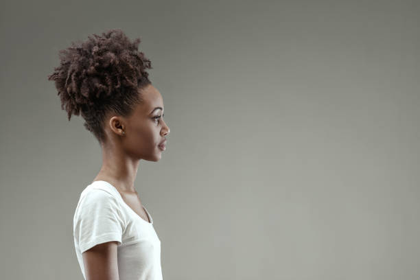 istock Intently listening, young woman's concentration evident 2149362443