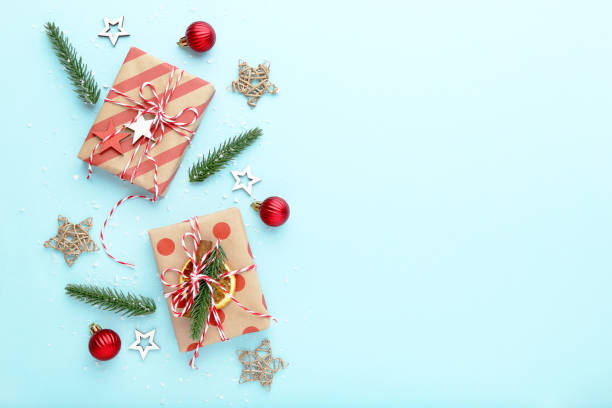 istock Christmas ornaments on blue background 2149362482