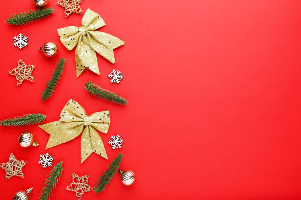 istock Christmas ornaments on red background 2149362699