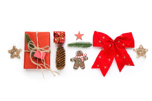 istock Christmas composition. Gift boxes with stars, red ,bow and gingerbread cookie on white background 2149362949