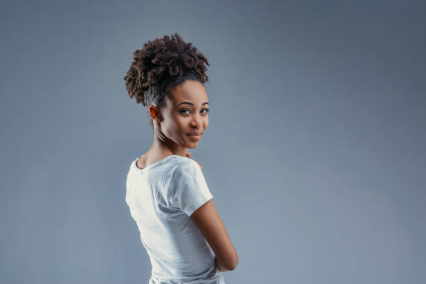 istock Turns shoulder, Black woman, mirthful eyes 2149363038