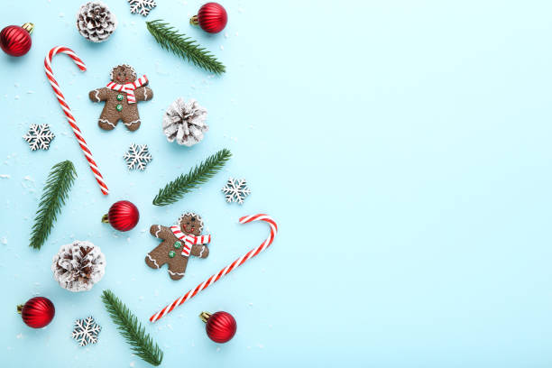 istock Christmas ornaments and cookies on blue background 2149363160