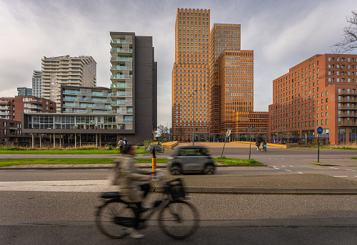 Traffic and modern architecture in Zuidas, famous business district of Amsterdam
