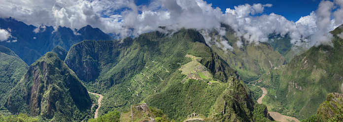 View from Huayna Picchu mountain of Machu Picchu the Andes and the valley of Machu Picchu village. Peru. Anden