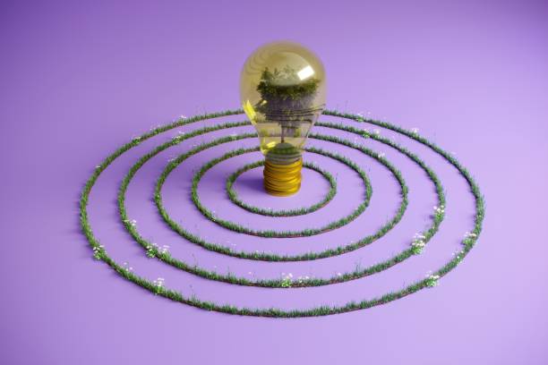 A tree inside a lightbulb, symbolizing sustainable energy, ESG finance concepts.