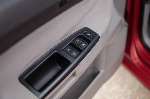 Car windows controls and adjustments interior details of door handle