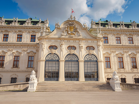 Wien, Austria - July 28, 2023: Belvedere Palace in summer sunny day. Baroque beautiful facade with statues and bas-reliefs of Lower Belvedere.