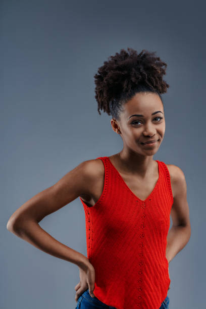 istock Playful confidence, woman in red stands out 2149371371