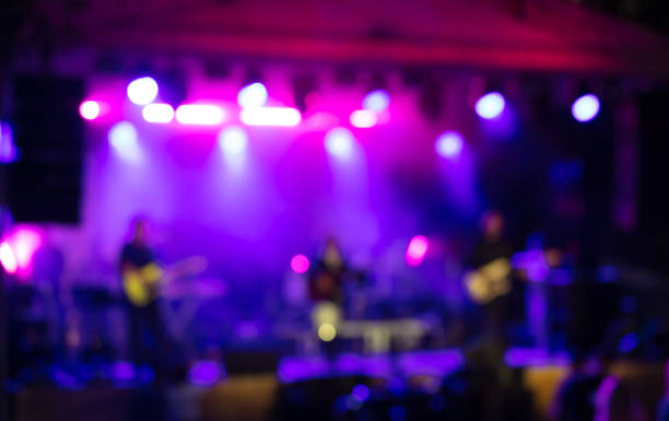 istock Bokeh from the concert from pink blue light 2149372120