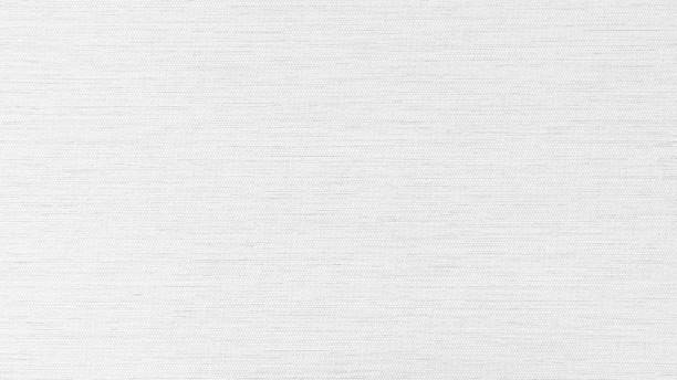 istock White fabric background of satin cotton silk wallpaper texture linen cloth pattern in pale pastel color 2149372744