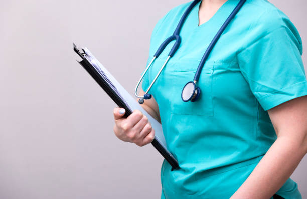 istock A nurse put a stethoscope to the heart itself, and ready to use. 2149373555