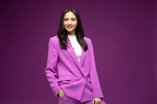 Portrait of her she nice well-dressed attractive lovely luxury pretty cheerful girl isolated purple background