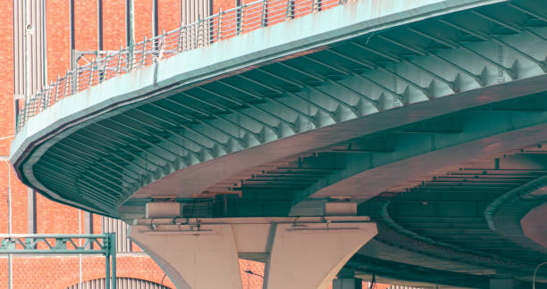 istock Concrete pillars of a large bridge. Bottom view 2149376694