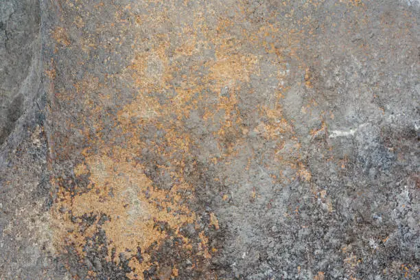 Rusty Metal Texture on Weathered Stone Surface
