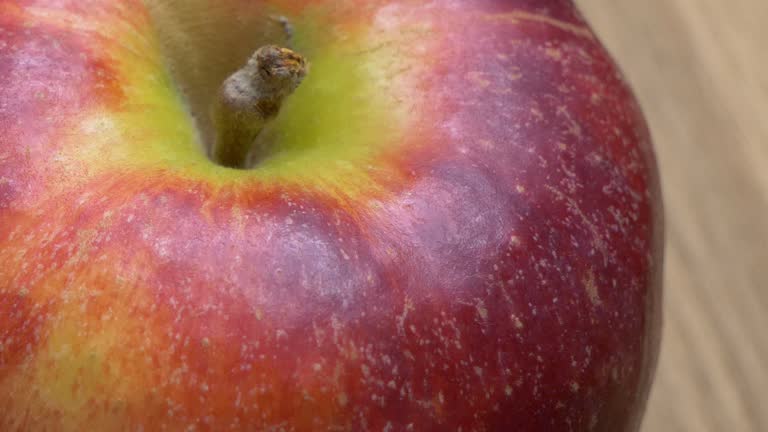 Gala apple close-up. Video in full hd format, sliding shot. A big ripe apple.