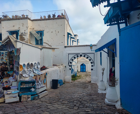 Sidi Bou Said, a famous village with traditional white and blue Tunisian architecture and flowering plants. Tunisia.