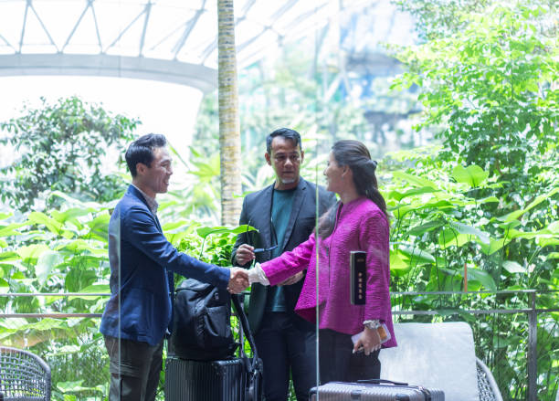 istock A group of business travelers shaking hands 2149385840