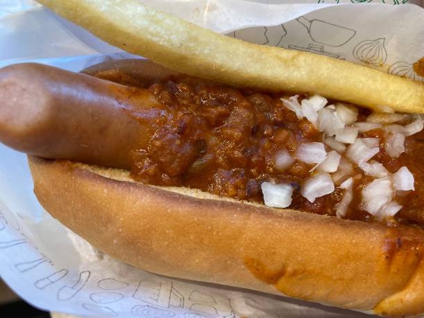 istock hot dog with chili sauce 2149386112